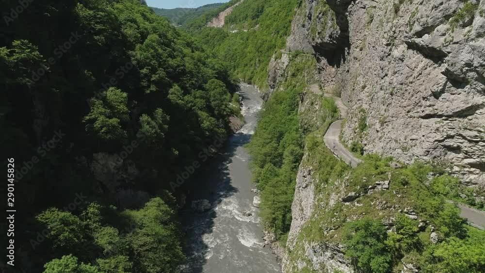 Fly over river in mountain valley Fly over river in mountain valley