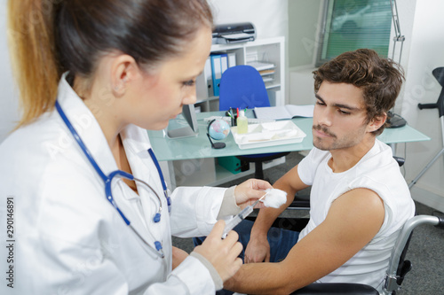 a doctor doing a vaccine
