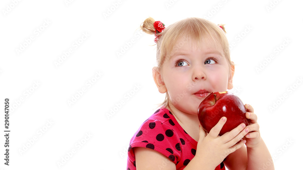 Little girl with apple.Isolated on white background. Little girl with apple.Isolated on white background.