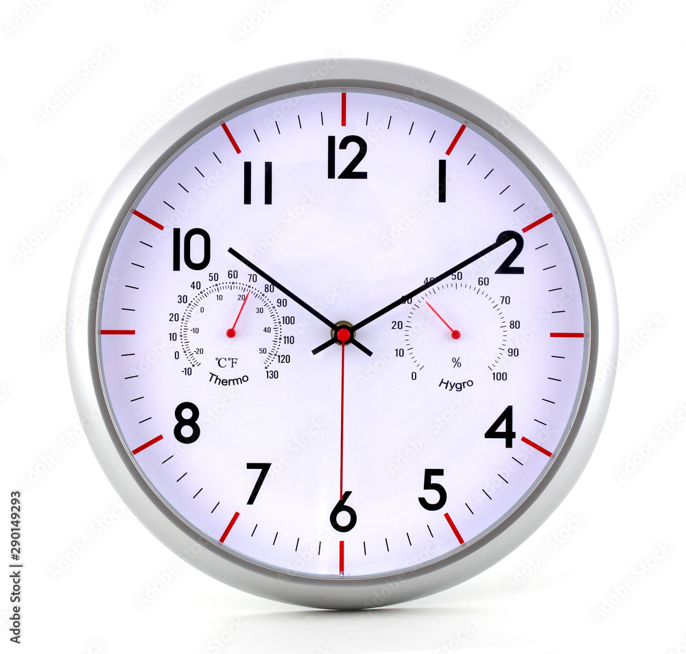 A metal clock with a stopwatch determines both the clock and the time. The clock is isolated on a white background. A metal clock with a stopwatch determines both the clock and the time. The clock is isolated on a white background.