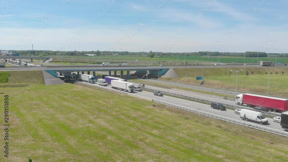 aerial view of highway road interchange with busy traffic (aerial) aerial view of highway road interchange with busy traffic (aerial)