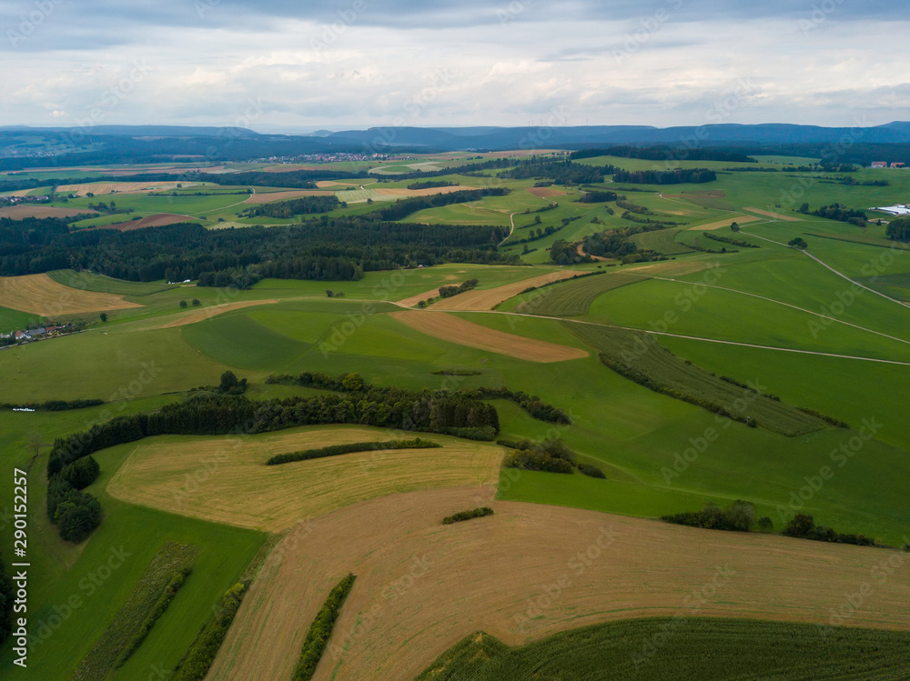 Aerial view on Witthoh tower with the long extinct volcanoes of the Hegau region near Lake Constance in Germany Aerial view on Witthoh tower with the long extinct volcanoes of the Hegau region near Lake Constance in Germany
