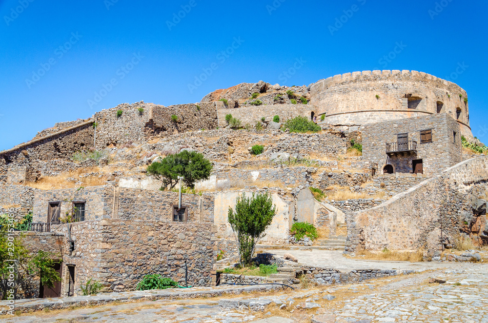 The ruins of old buildings in Spinalonga island of lepers in Crete, Greece