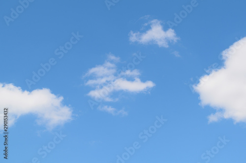 Beautiful background of blue sky and white clouds. Texture.