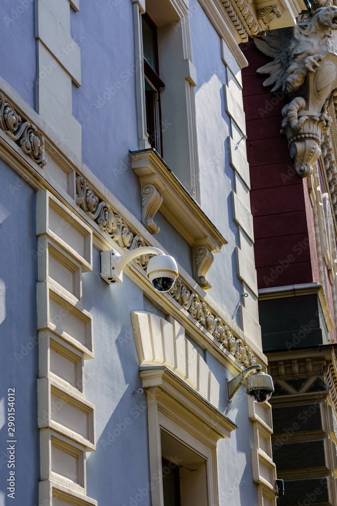 Security camera on a facade of the residential building Security camera on a facade of the residential building