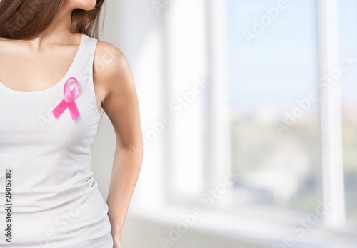 Free Download Heart framing from fingers on woman chest with pink badge to support breast cancer cause, PS: you can change the ribbon color to red to support AIDS cause as both using same symbol - GFXLoad