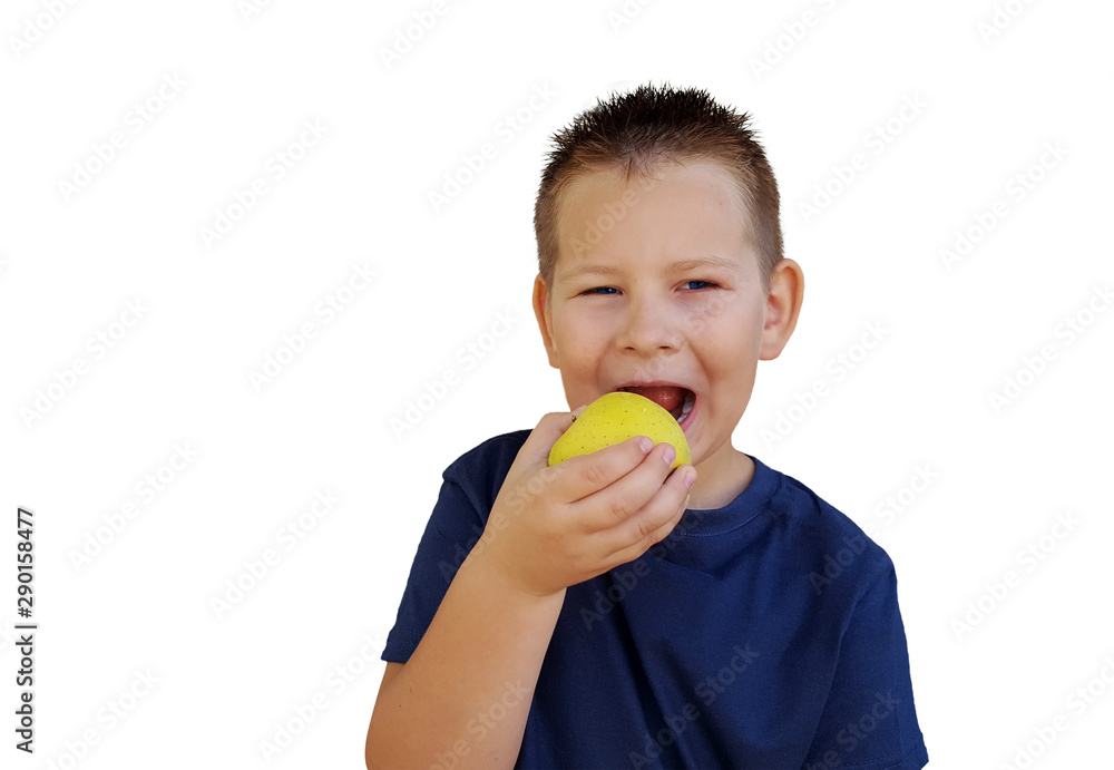Young boy eating juicy green apple Young boy eating juicy green apple