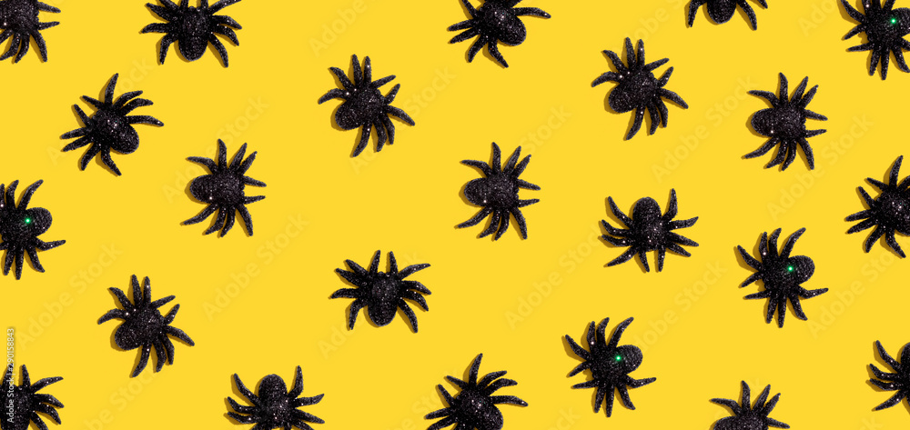 Halloween black spiders - overhead view flat lay Halloween black spiders - overhead view flat lay