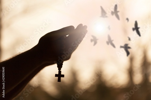 Woman praying and free bird...