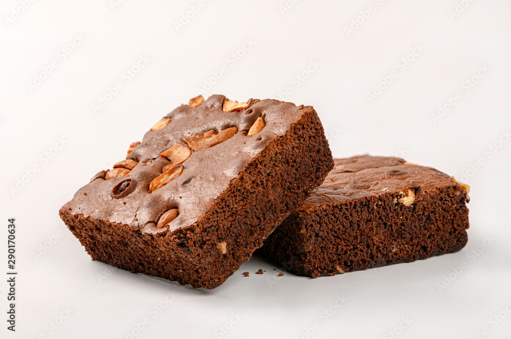 Fresh brownie with c ashew nut isolated on white background. Fresh brownie with c ashew nut isolated on white background.