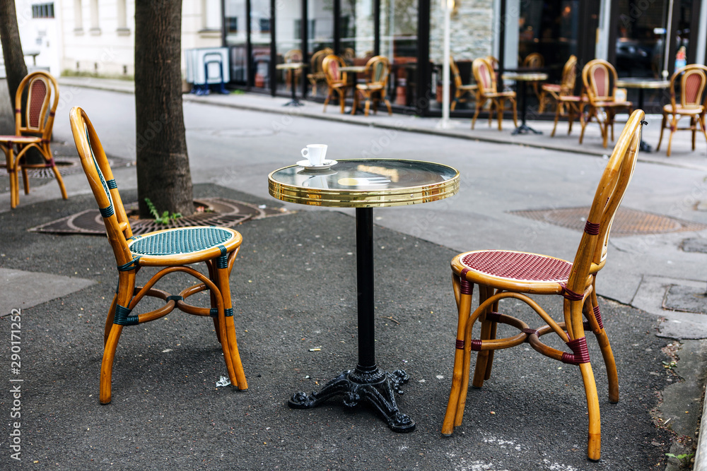 Street French cafe. Coffee cup on a table. paris