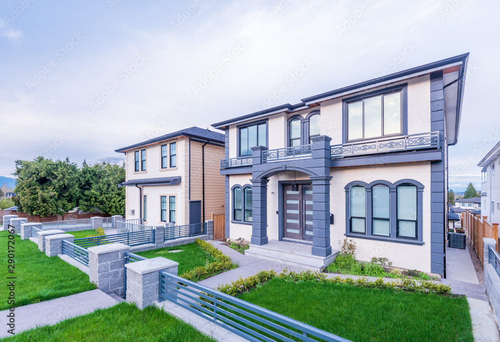 Houses in suburb at Summer in the north America. Luxury houses with nice landscape. Houses in suburb at Summer in the north America. Luxury houses with nice landscape.