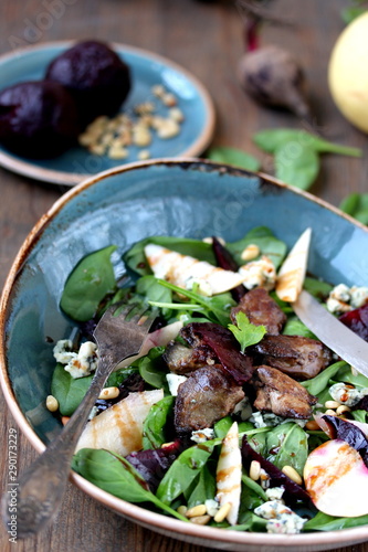 salad with fried chicken liver, beets, gorgonzola cheese, pear, cashew nuts, mini spinach.