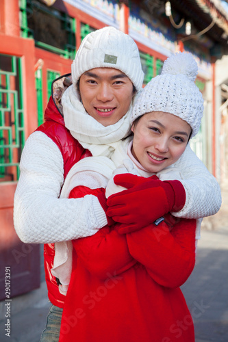 Couple dressed in holiday attire