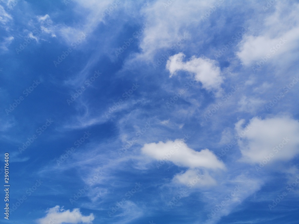 Stratocumulus white clouds in the blue sky natural background beautiful nature 