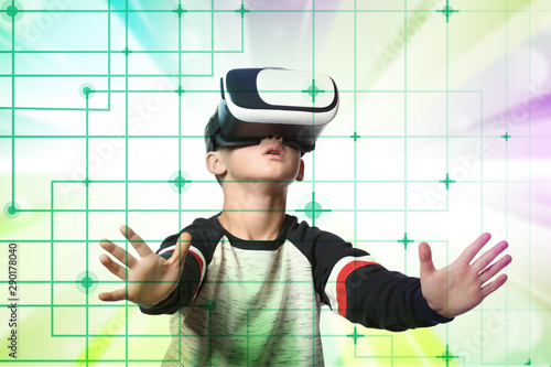 Cute boy wearing VR glasses...