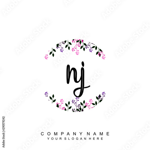 letter NJ surrounded by beautiful and elegant flowers and leaves. Wedding monogram logo template. Fashion Logo template Vectors 