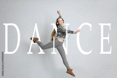 Young female dancer on whit...