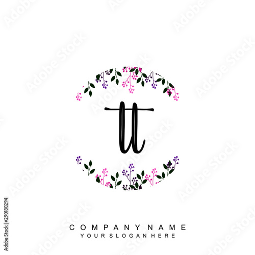 letter TT surrounded by beautiful and elegant flowers and leaves. Wedding monogram logo template. Fashion Logo template Vectors,