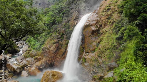 Flying near Rainbow Waterfalls in Cheerapunji, Meghalaya, India photo