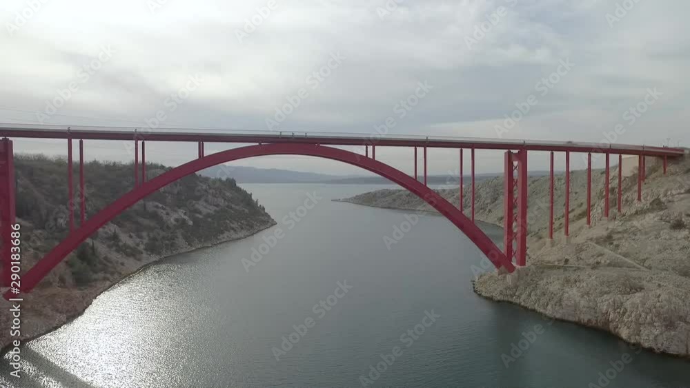 Maslenica bridge, Croatia. Red steel bridge in george. View on Maslenica strait. Drone Shot Maslenica bridge, Croatia. Red steel bridge in george. View on Maslenica strait. Drone Shot