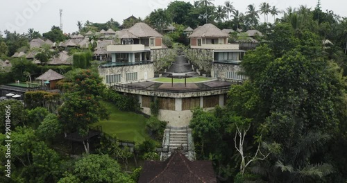 4K Aerial Drone footage Flying Over a luxury private resort with private pool villas in Ubud Bali. reveal Shot in Kamandalu indonesia photo