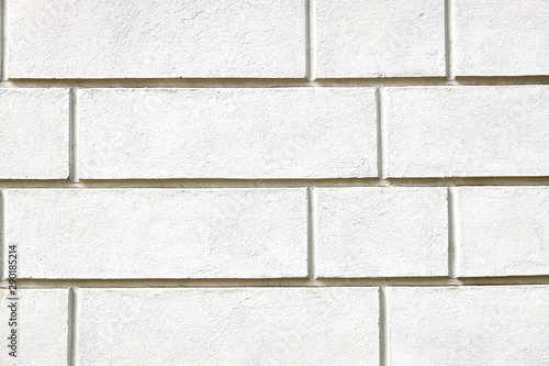 Background from a wall with white stone slabs