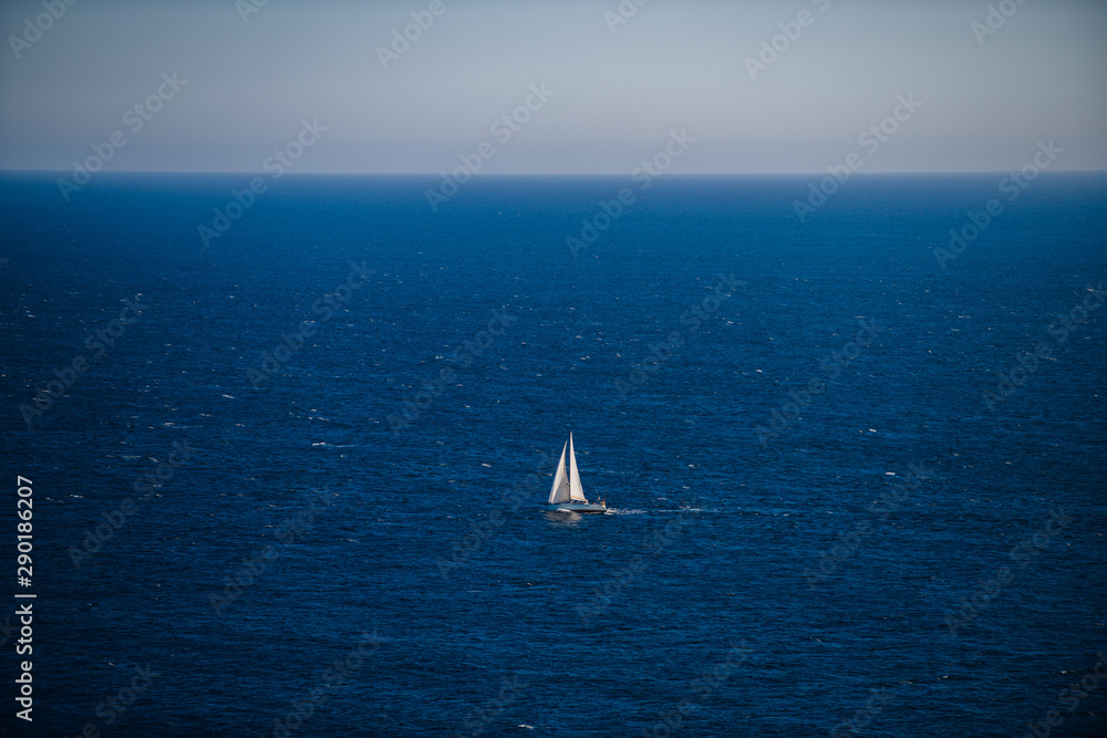 Lonely yacht in the Atlantic Ocean off the coast of Brittany. Finister. Brittany. France
