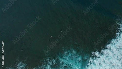 Aerial footage of surfers enjoying the waves at Mount Irvine Bay on the Caribbean island of Tobago photo