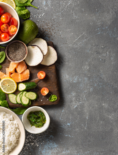 Ingredients for preparation poke bowl with salmon, avocado, vegetables and chia seeds top view