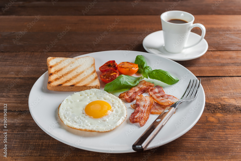 Fried eggs with bacon and vegetables Fried eggs with bacon and vegetables