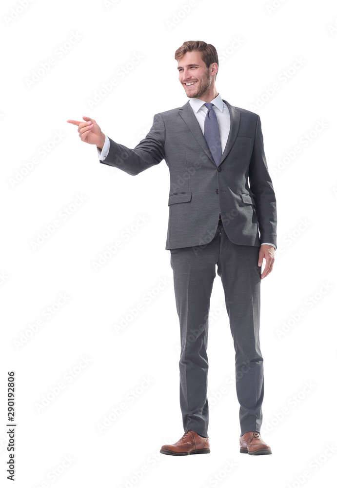 in full growth. businessman with a hand in a welcoming gesture. in full growth. businessman with a hand in a welcoming gesture.