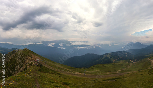 mountain landscape on a cloudy summer day - panorama over the observation deck on the top of Kamenny Pillar  2502m  - Aibga mountain range  Western Caucasus  South of Russia