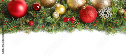Fir tree branches with Christmas decoration on white background  flat lay