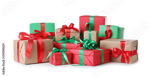 Different Christmas gift boxes on white background