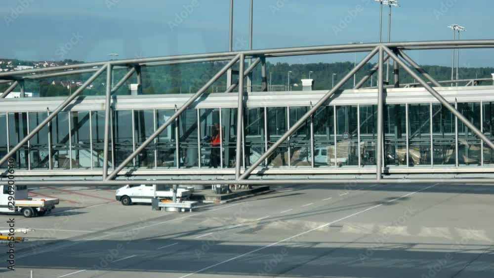 People walking to the plane on a retractable ladder People walking to the plane on a retractable ladder