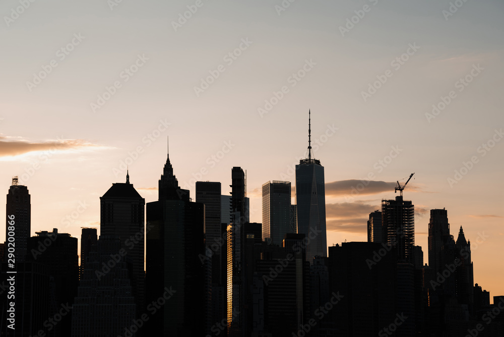 Cityscape with high-rise buildings at dusk Cityscape with high-rise buildings at dusk