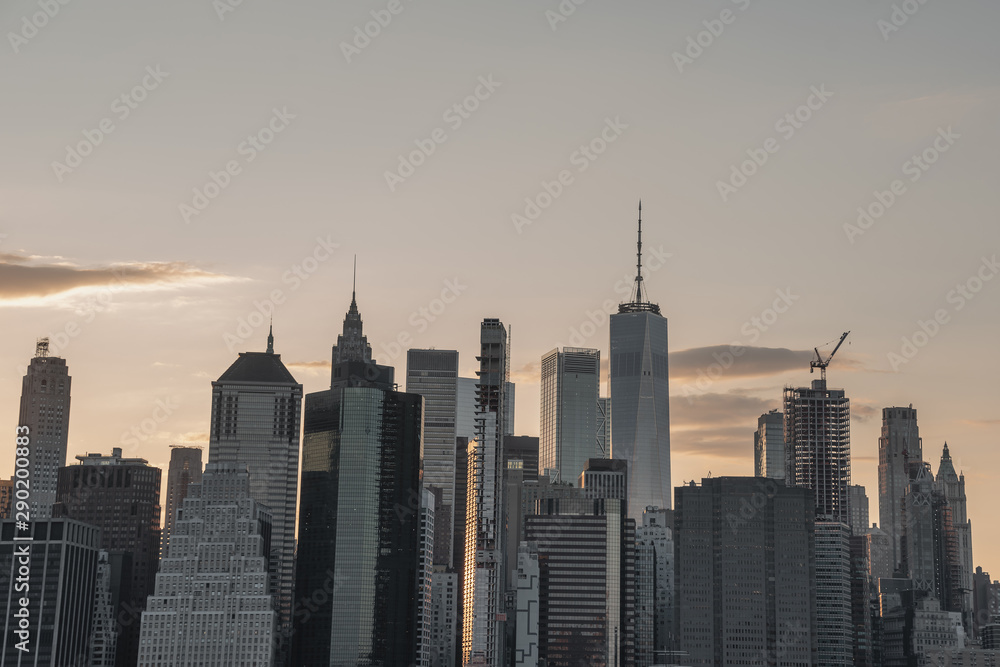 Urban skyline with skyscrapers at dusk
