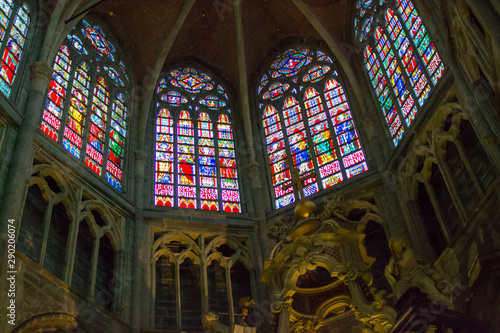 Colorful stained glass window inside of the Saint Bavo Cathedral  or Sint-Baafs Cathedral  in Ghent  Belgium  Europe