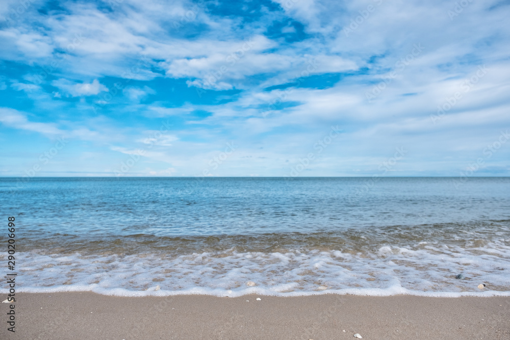 Landscape image of tropical white beach with blue sea and sky background Landscape image of tropical white beach with blue sea and sky background