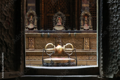 Vajra at Golden temple or Kwal Bahal temple in nepali unique Buddhist monastery located on north of Patan Durbar Square,Kathmandu,Nepal photo