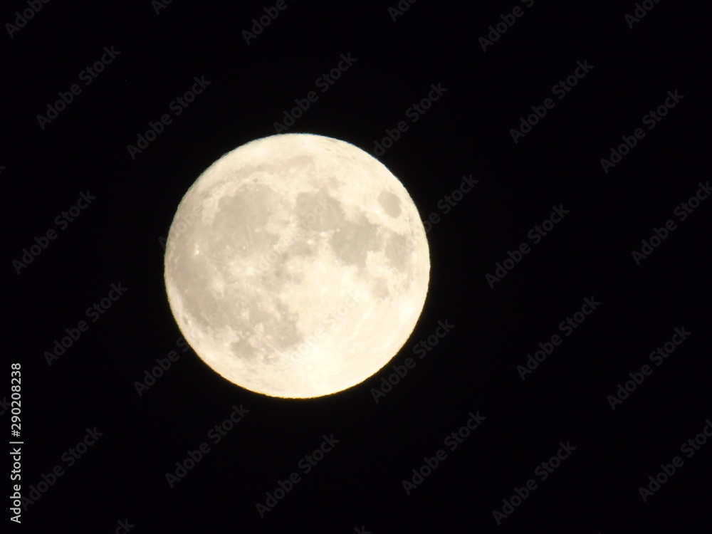 Genova, Italy - 09/13/2019: An amazing photography of the full moon over the city of Genova by night with a great clear sky in background and some stars Genova, Italy - 09/13/2019: An amazing photography of the full moon over the city of Genova by night with a great clear sky in background and some stars