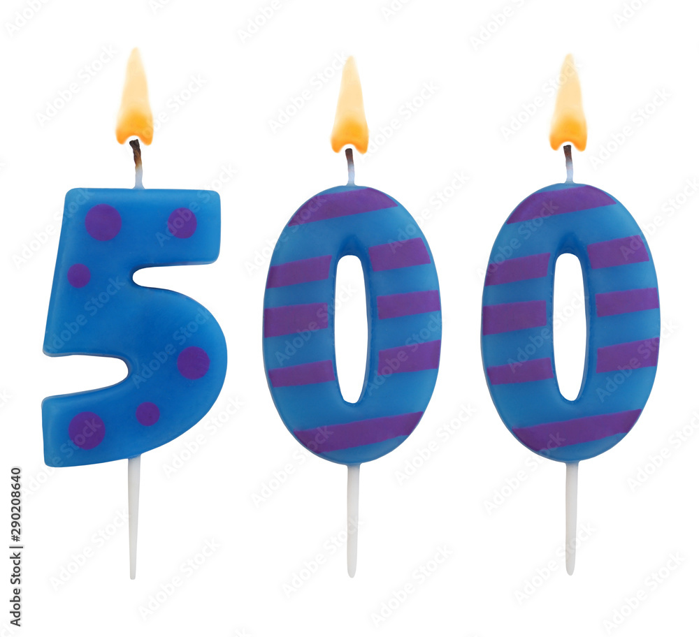 Burning birthday candles isolated on white background, number 500 Burning birthday candles isolated on white background, number 500