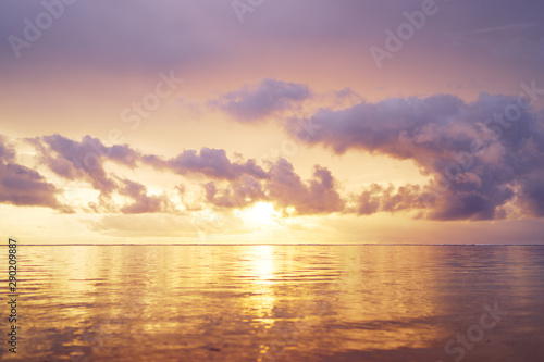 Beautiful seascape with sunrise cloudy sky.