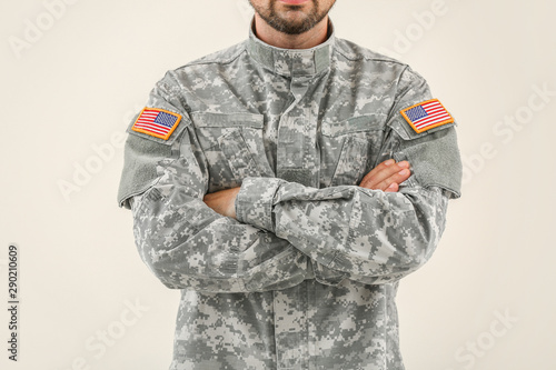 Soldier in camouflage on li...