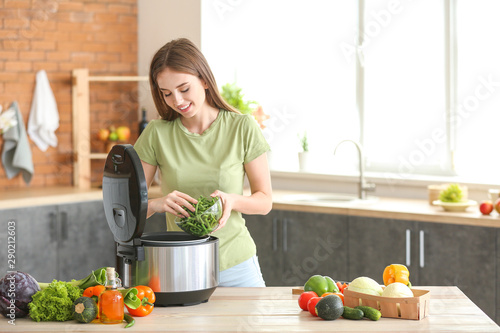 Woman using modern multi co...