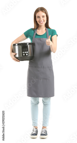 Woman with modern multi cooker showing thumb-up on white background