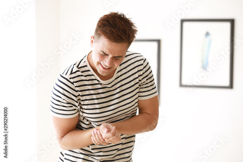 Young man suffering from pa...