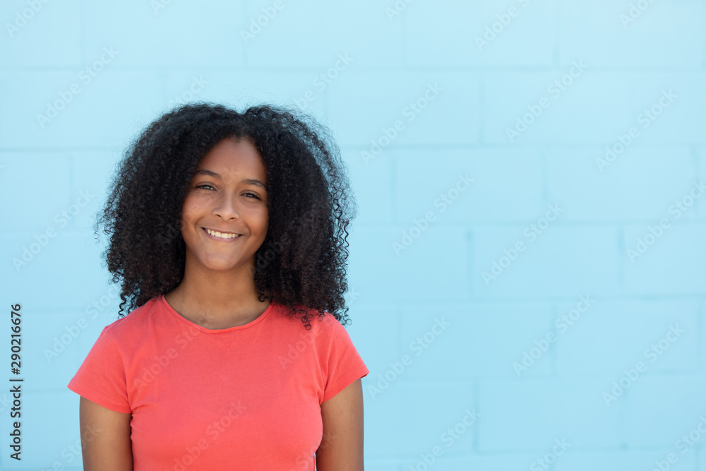 Teenager girl with a beautiful afro hair - obrazy, fototapety, plakaty 