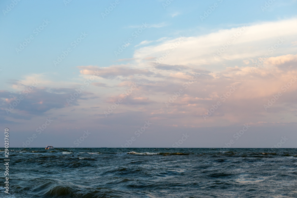 Fototapeta premium Sea landscape with waves on the water in pastel colors